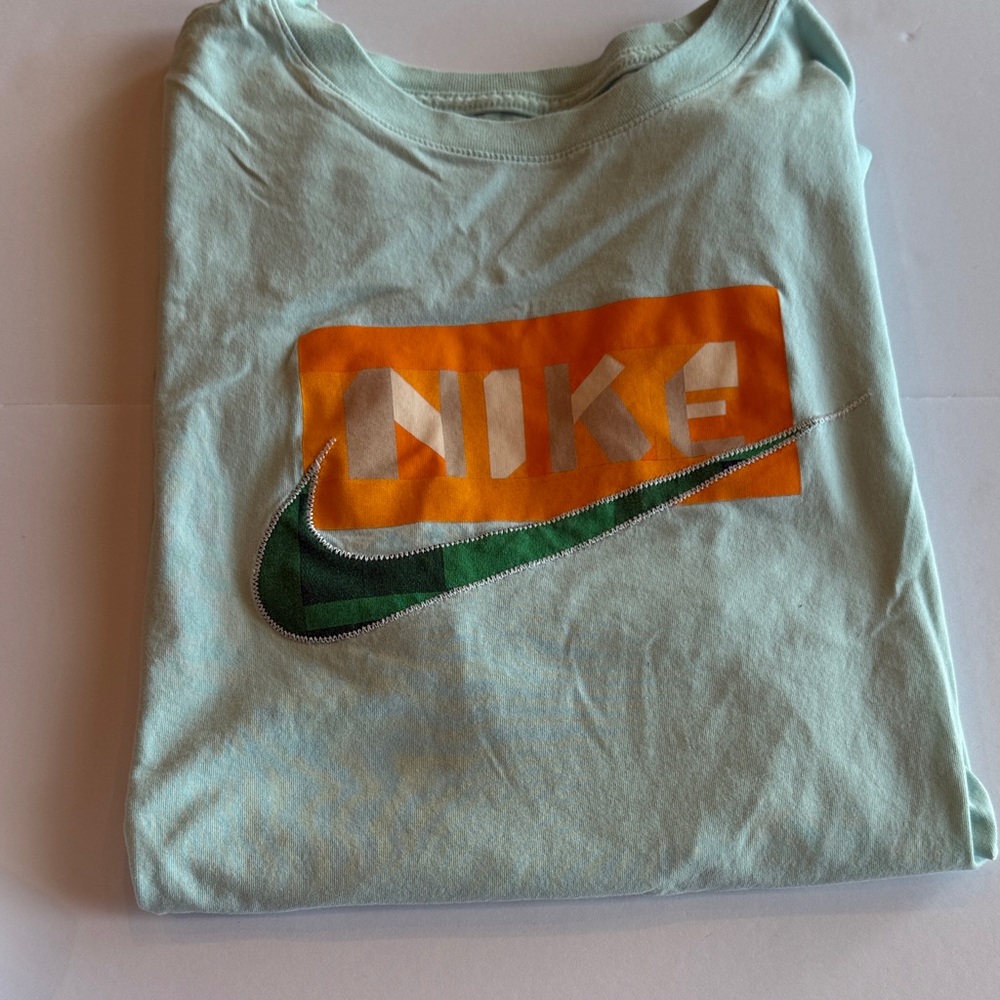 Nike Aqua Tee with Orange and Green Logo